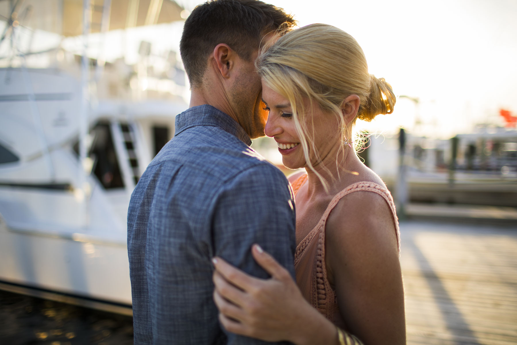Couple Embracing on Boat Dock
