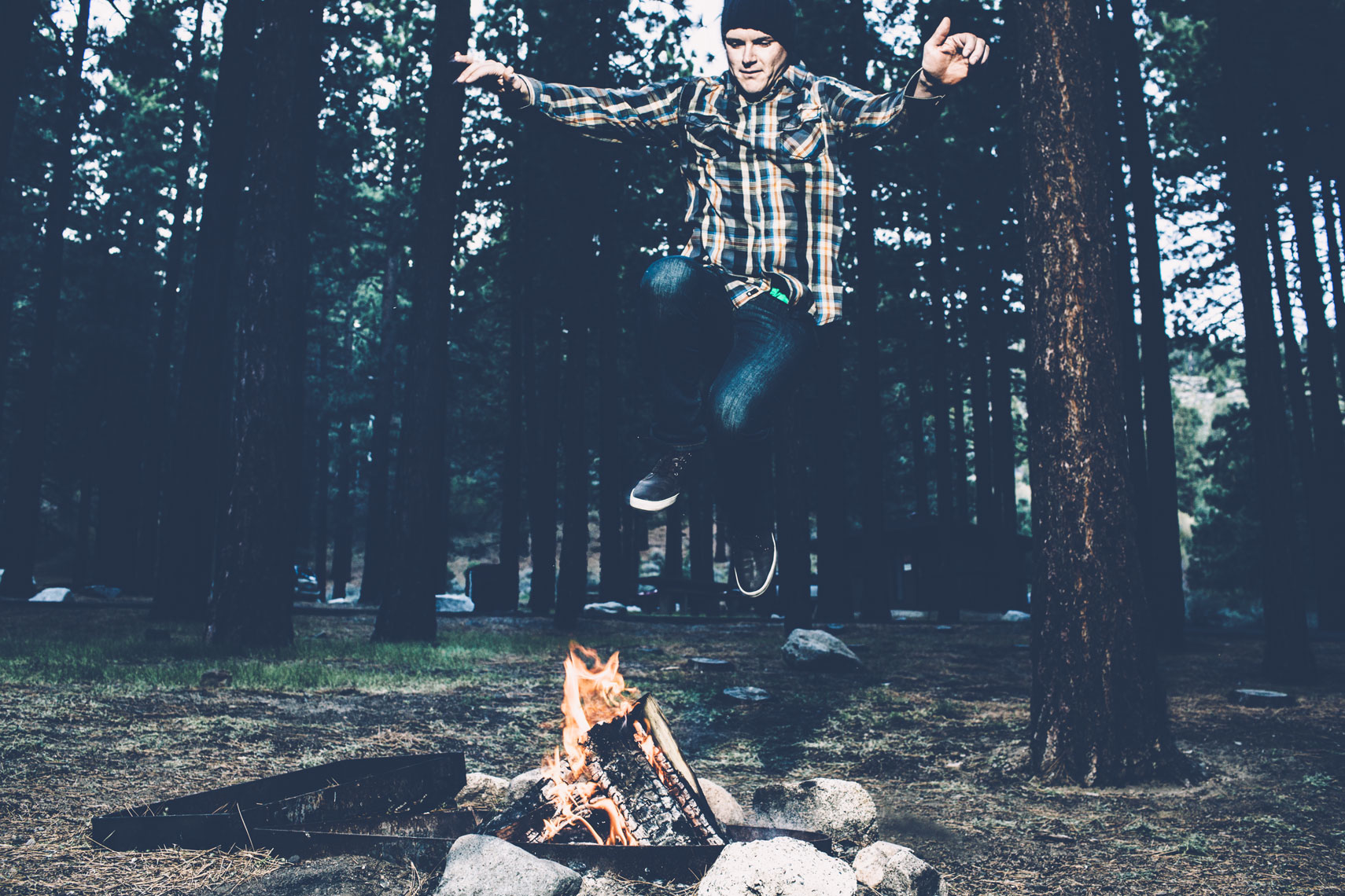 Man Jumping Campfire